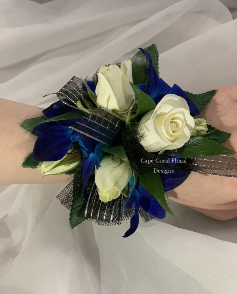 White Spray Rose & Blue Boms Corsage